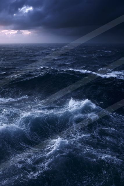 A dramatic water scene of an ocean, ripples.