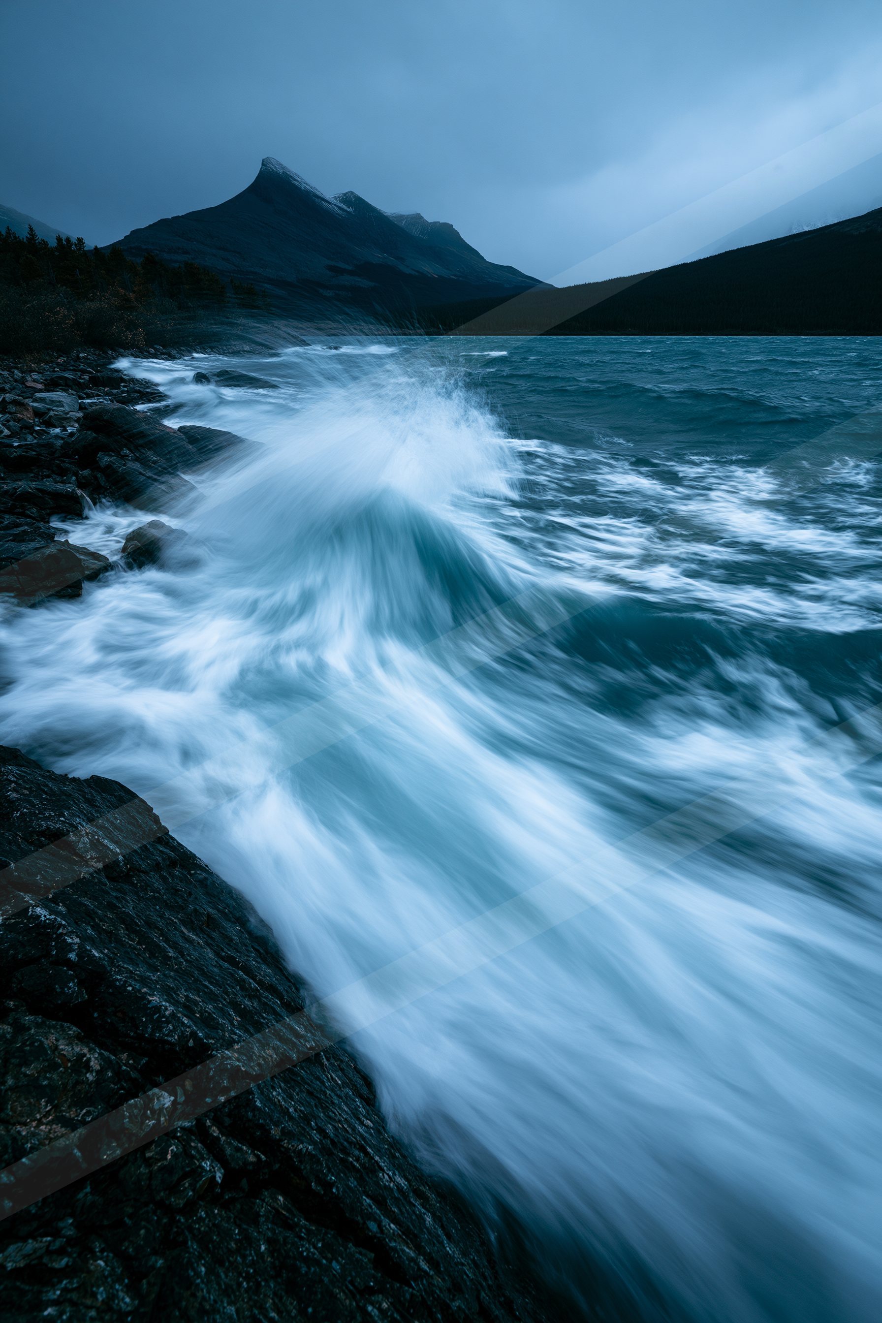 A dramatic long exposure water scene of an ocean waves, ripples.