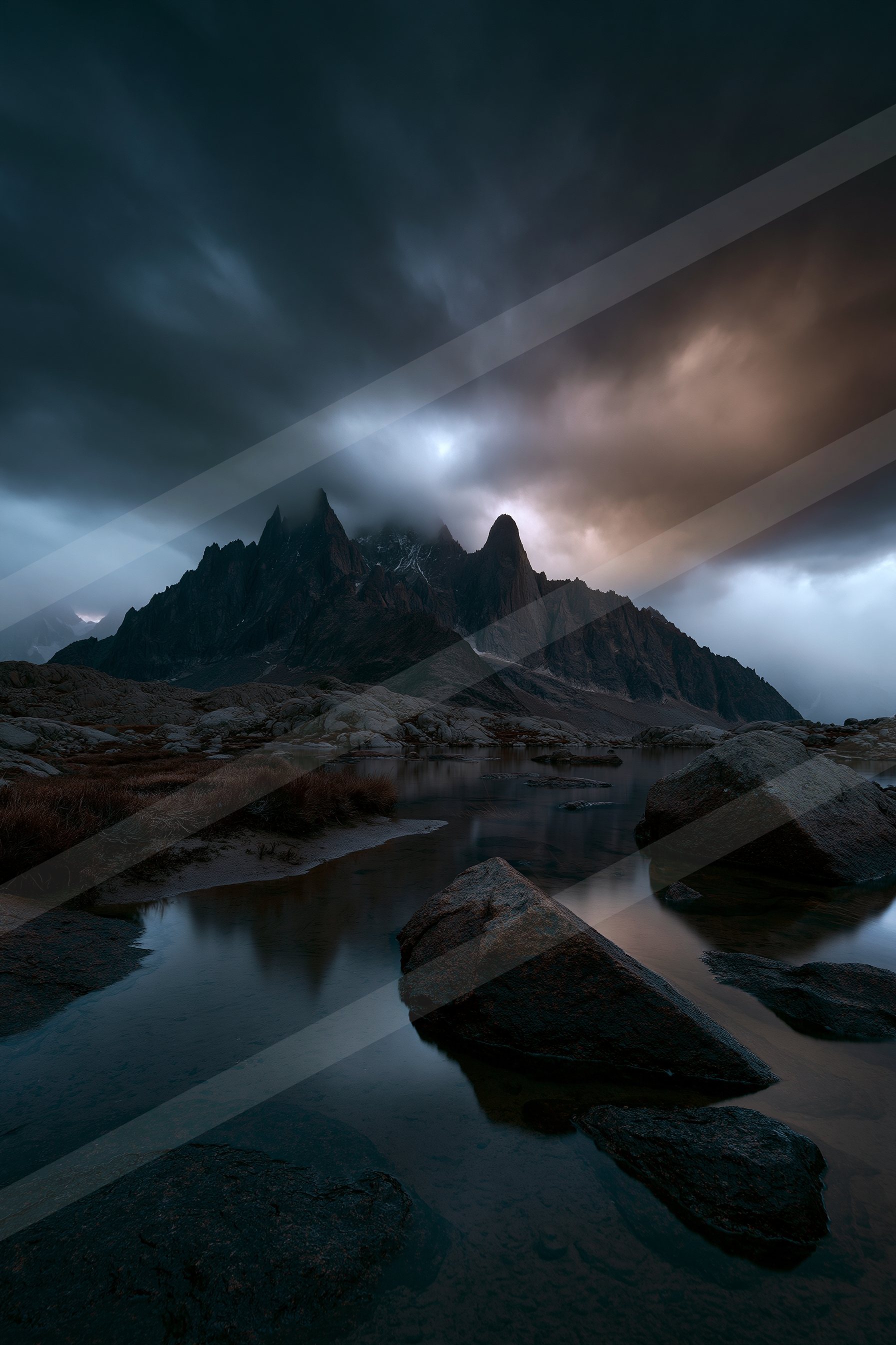 A dramatic long exposure landscape of a mountains, reflection.