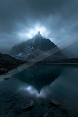 A night landscape of mountains, lake.