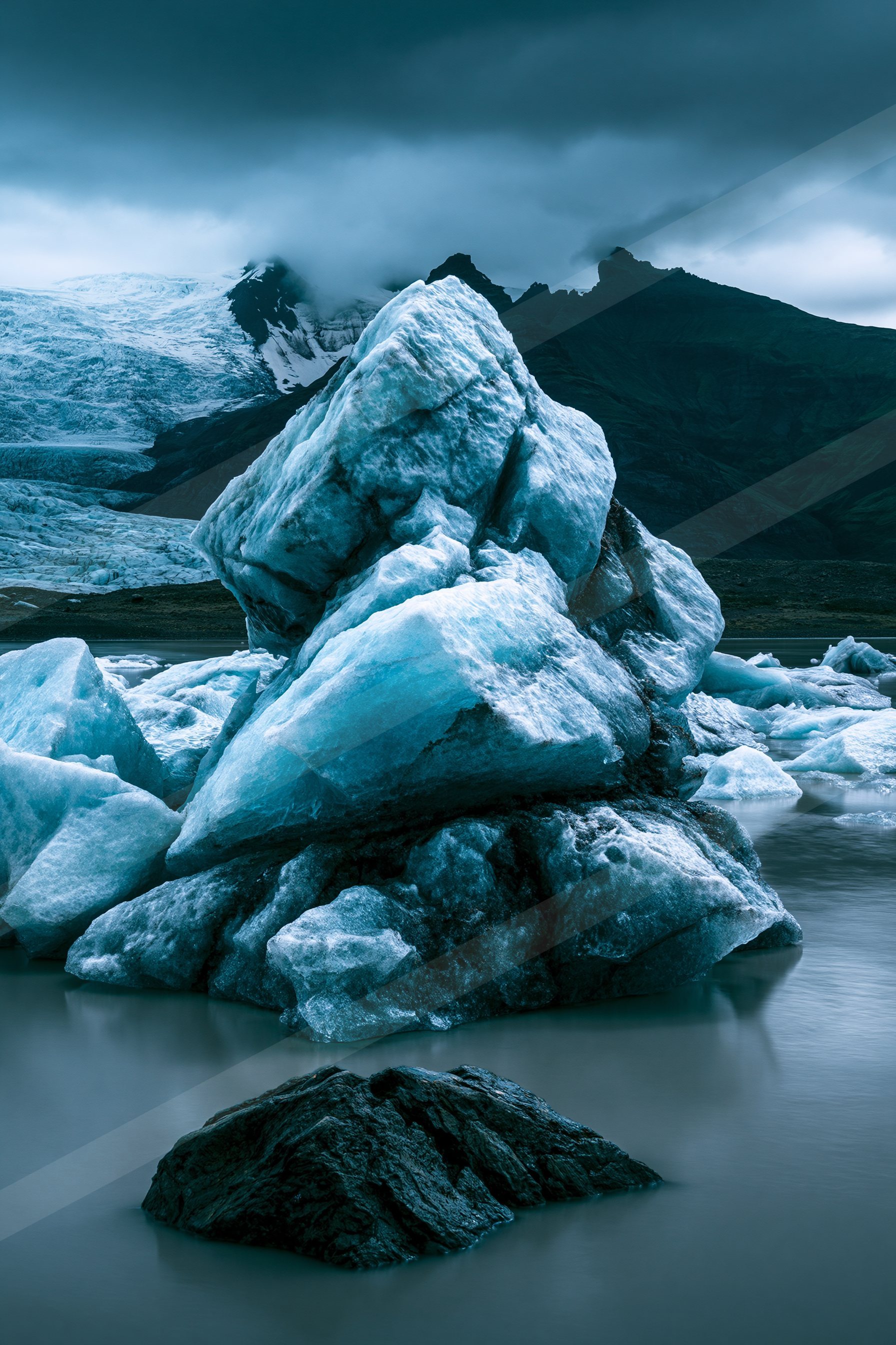 A dramatic high contrast landscape of a glacier, ice.