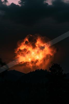 A dramatic sky scene of clouds, storm, sunset.