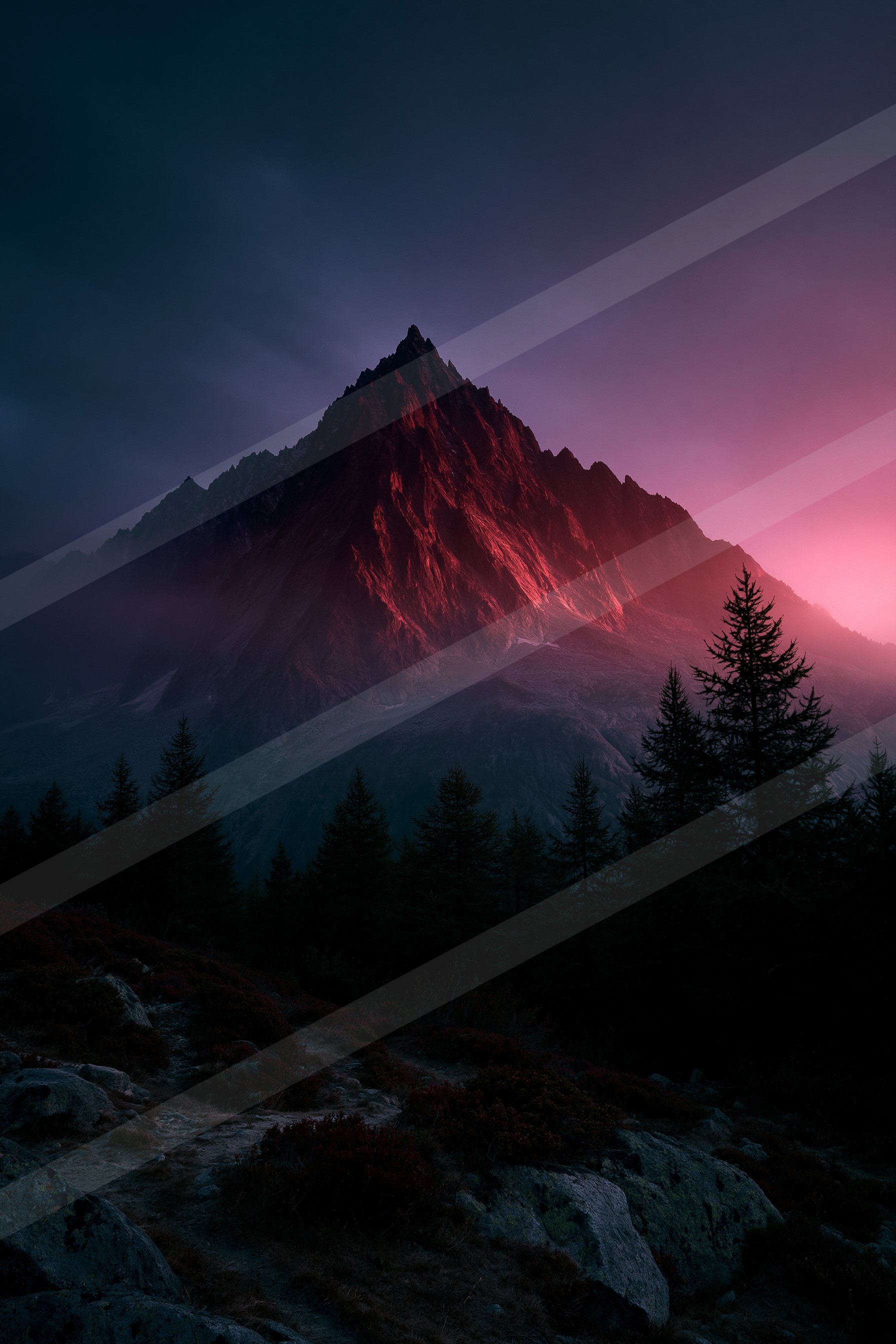 An ethereal landscape of a mountains, fog.
