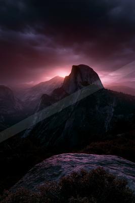 A dramatic landscape of mountains, valley.