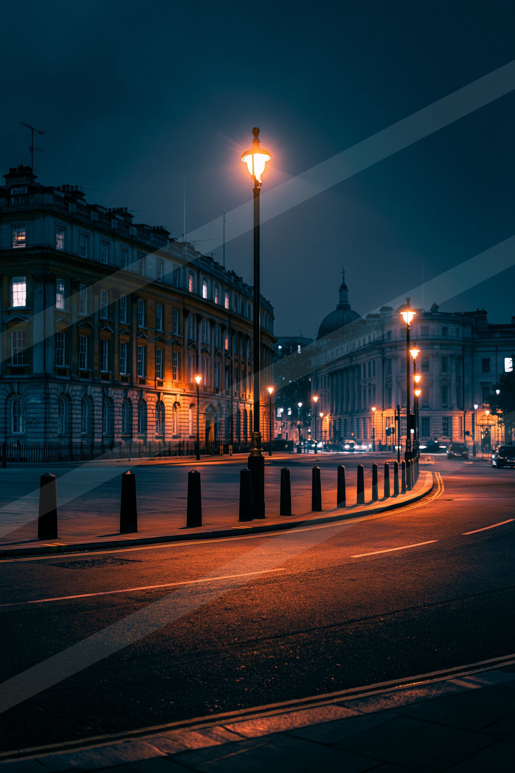 A night high contrast street scene of a road.