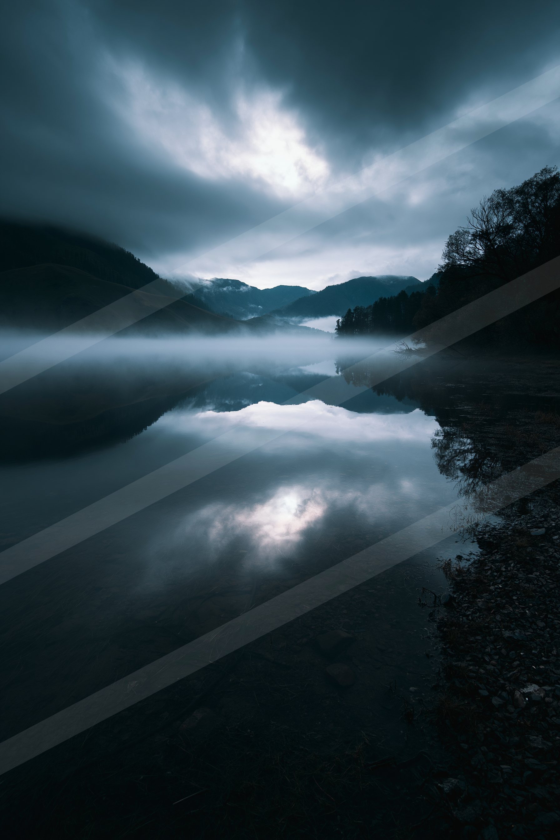 A mysterious long exposure water scene of a lake, reflection.