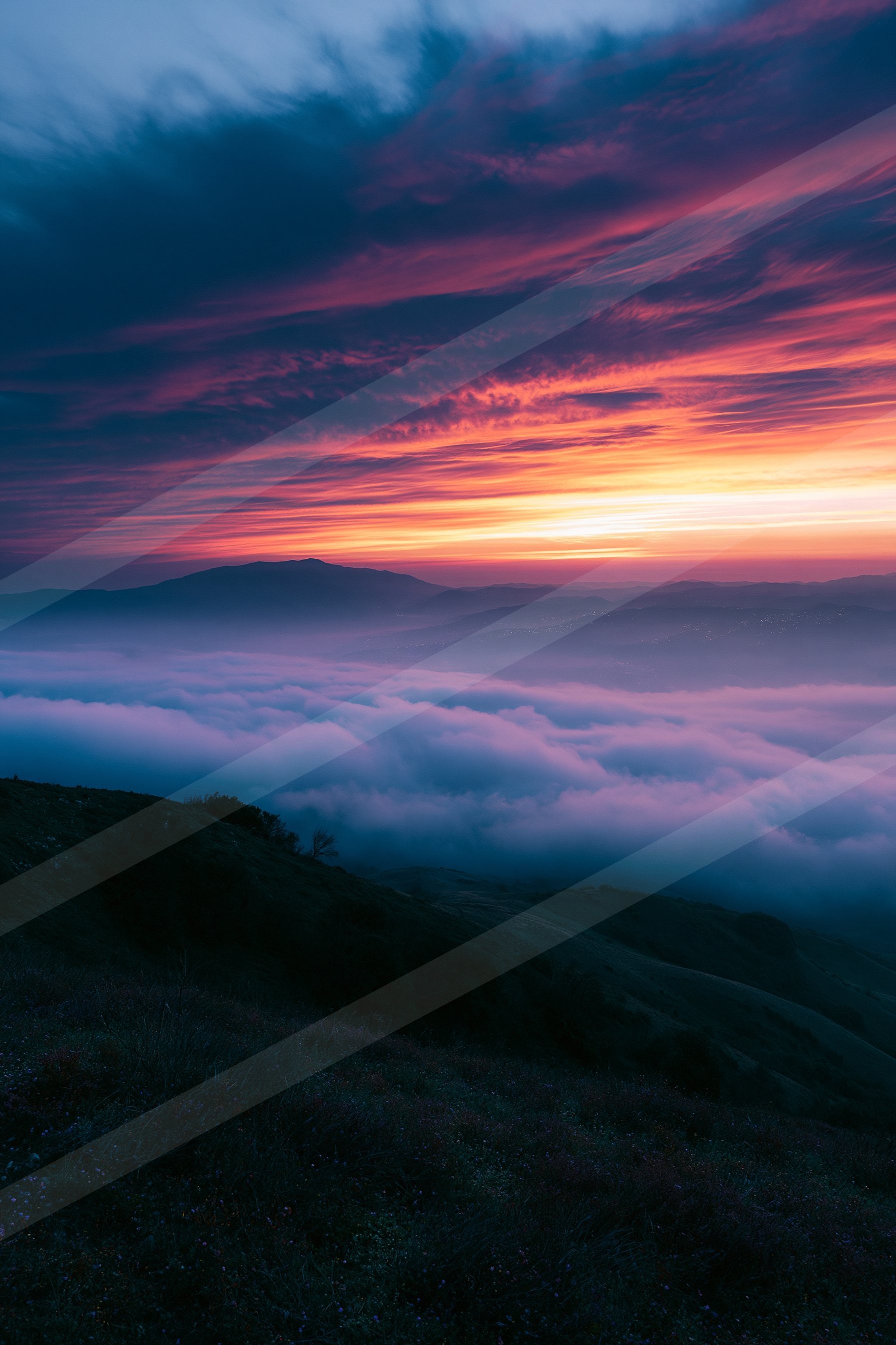 A blue hour panorama sky scene of a sunrise, fog.