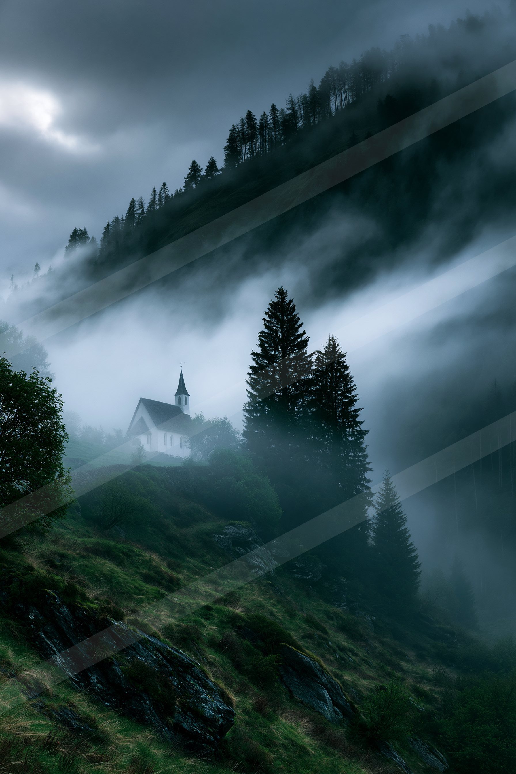 A dramatic landscape of a mountains, fog.
