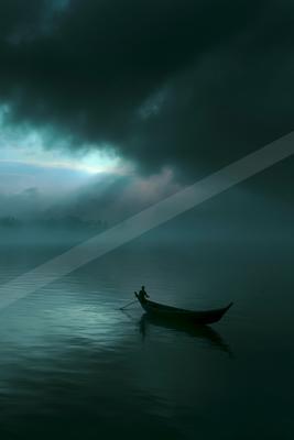 A serene long exposure water scene of lake, storm, ocean.