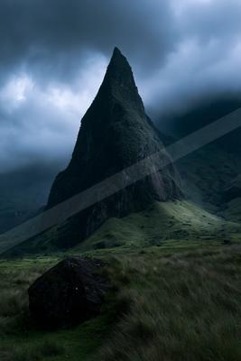 A dramatic landscape of mountains.