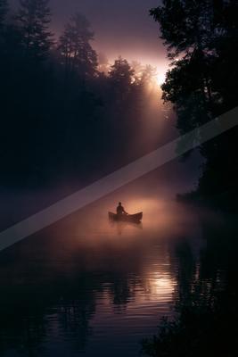 A night water scene of lake, fog.