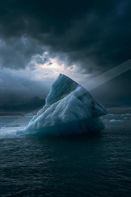 A blue hour water scene of ocean.