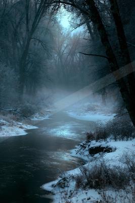 A night water scene of river, fog.