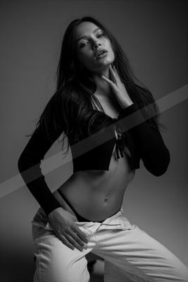 A black-and-white dramatic portrait.