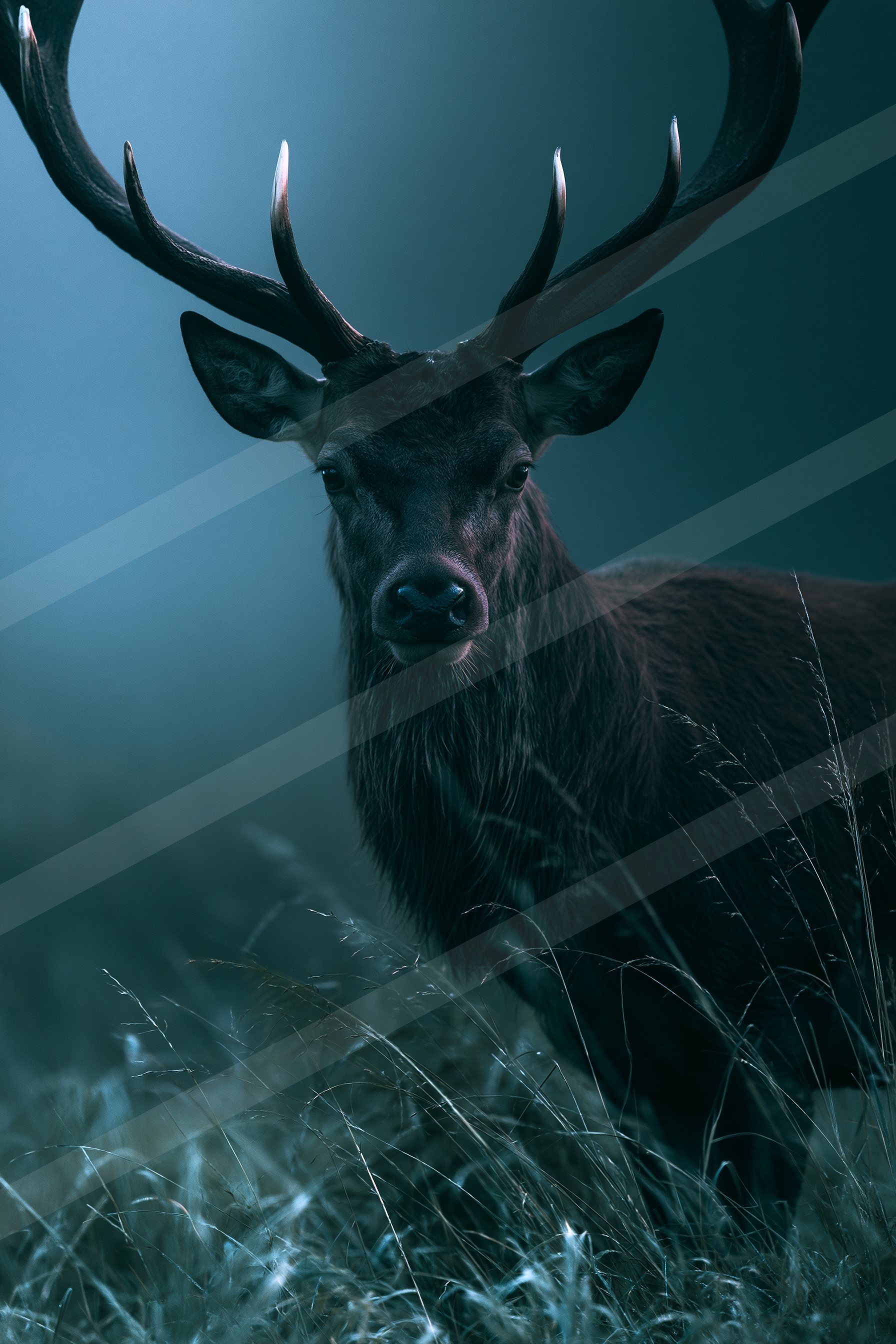 A powerful stag with large antlers stands alert in a misty forest, its dark fur contrasting against the ethereal blue tones of the surroundings.
