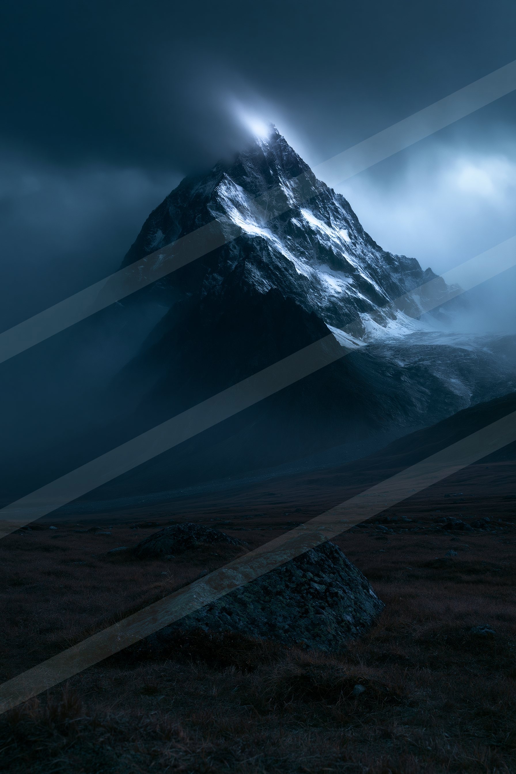 A mysterious landscape of a mountains, fog.