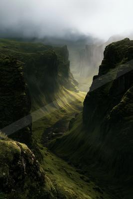 A dramatic panorama landscape of a plateau, fog.