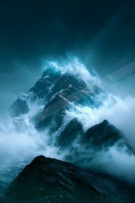 A blue hour landscape of mountains.