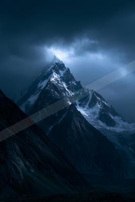 A moody landscape of mountains.