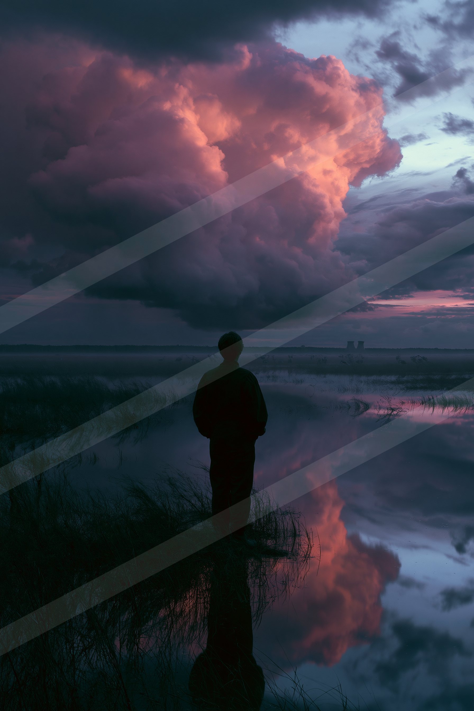 A dramatic high contrast sky scene of a storm, reflection.