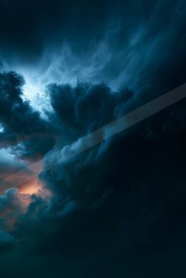 An ethereal high contrast sky scene of a storm.