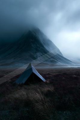 A night landscape of mountains, fog.