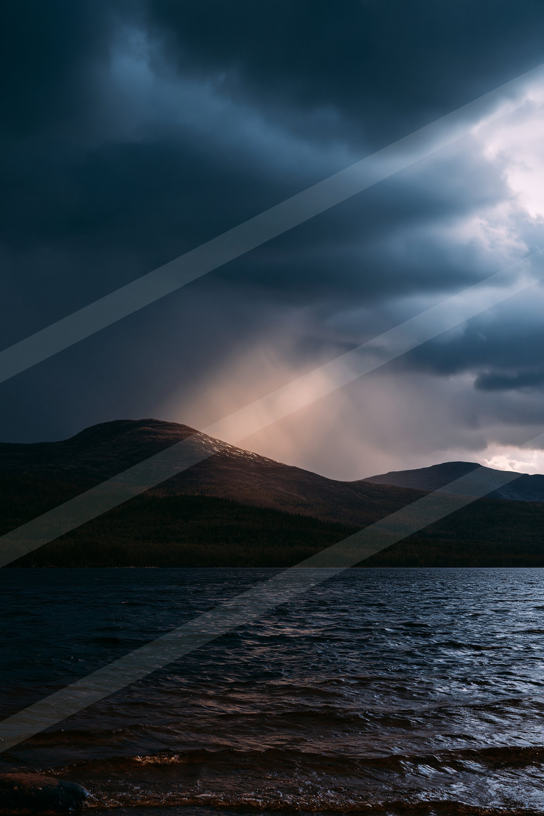 A night high contrast sky scene of a storm, ripples.