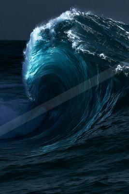 A dramatic water scene of an ocean waves, ripples.