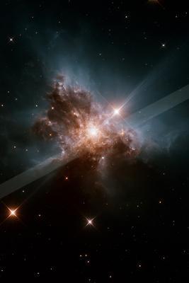 A vibrant star cluster surrounded by glowing dust clouds against a dark cosmic backdrop.