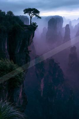 A dramatic panorama landscape of a plateau, fog.