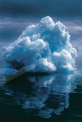 A large, textured blue and white iceberg floats in dark, calm water with its reflection visible below, under a moody overcast sky.
