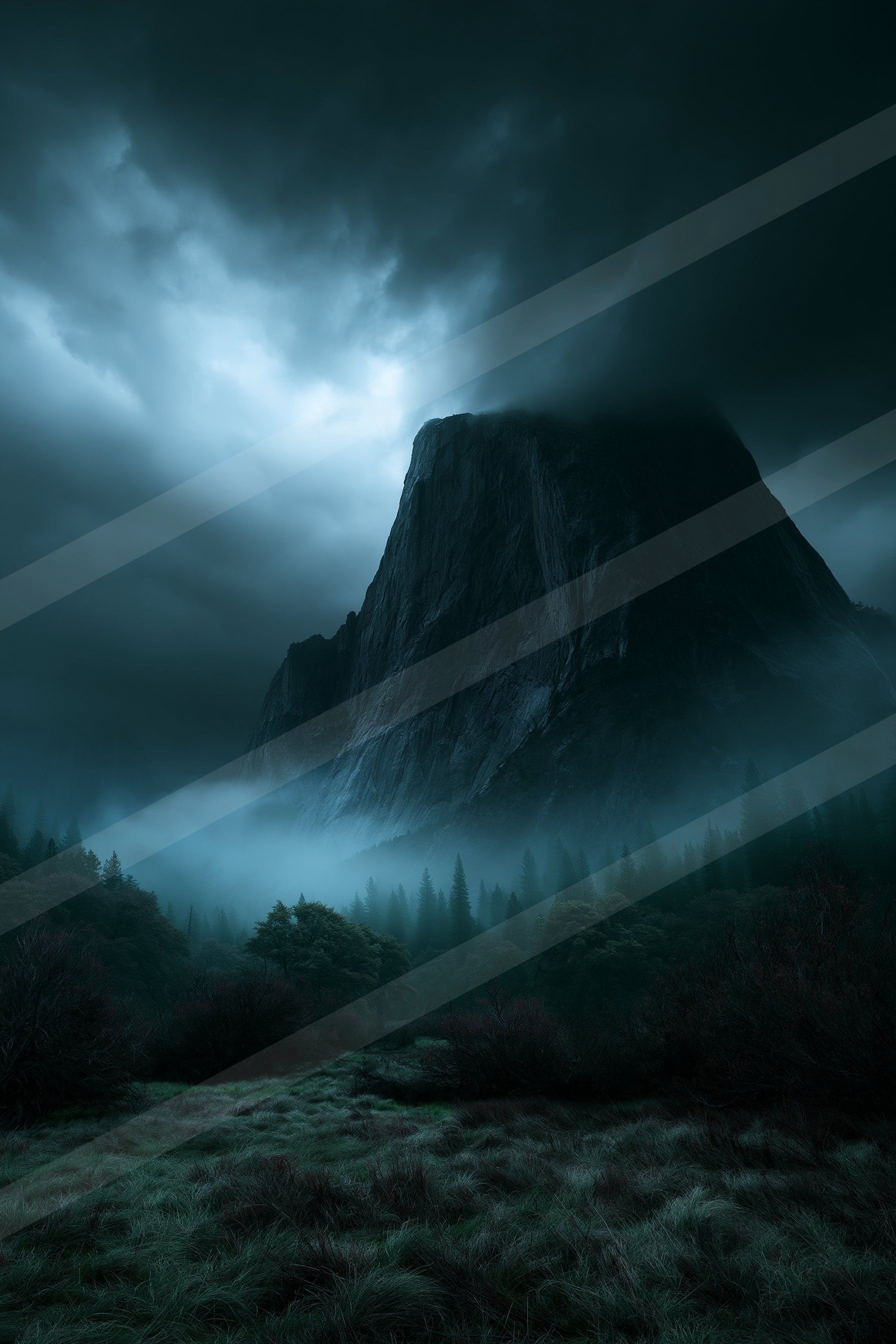 A towering mountain shrouded in mist at dusk, surrounded by a forested valley under a moody sky.