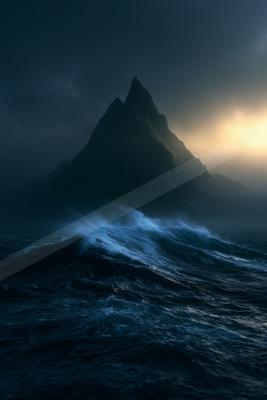 Massive turbulent ocean waves with white foam crashing in the foreground, with a tall dark jagged mountain rising into a cloudy stormy sky, illuminated by a low