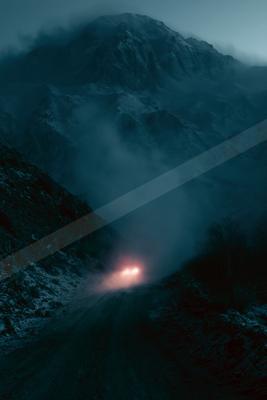 A moody landscape of mountains.