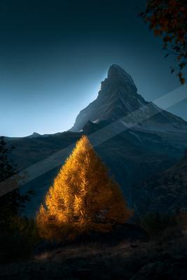 A moody landscape of mountains.