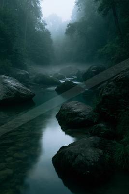 A serene water scene of river, waterfall.