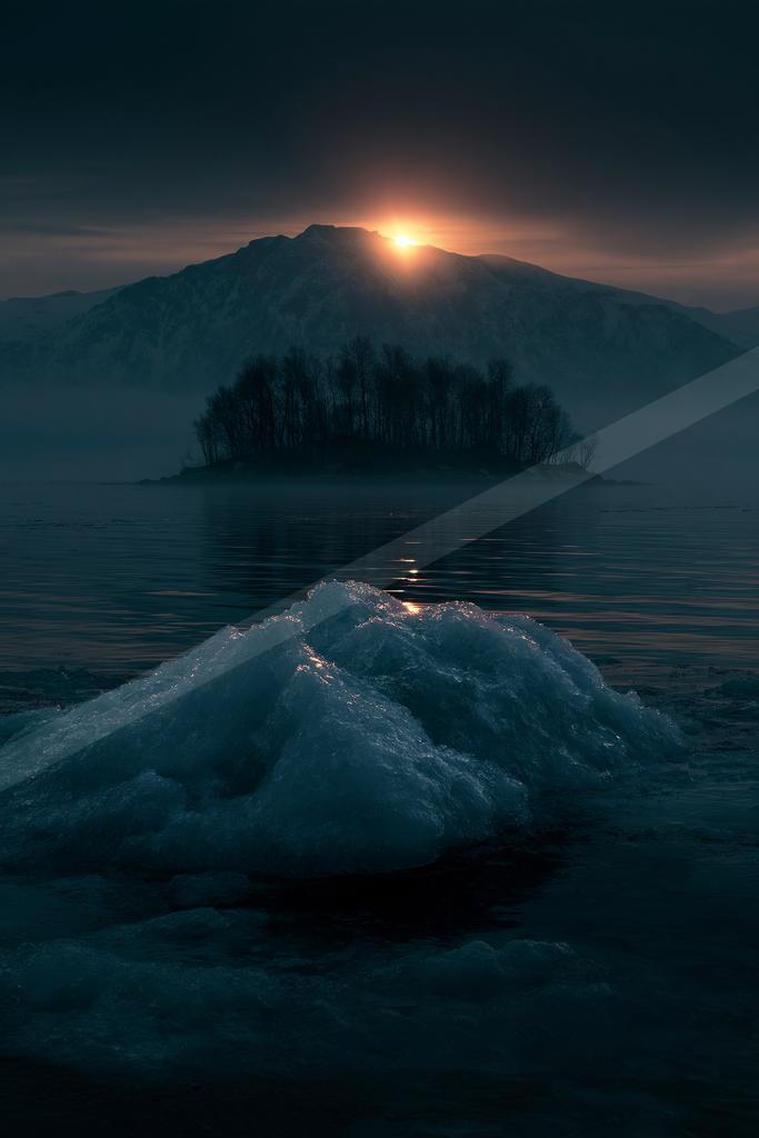 A blue hour water scene of ocean, lake.