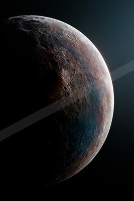 A detailed view of a rugged celestial body with varied textures and colors set against the dark expanse of space.