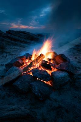 A black-toned moody photograph of volcano, caldron, dutch oven.