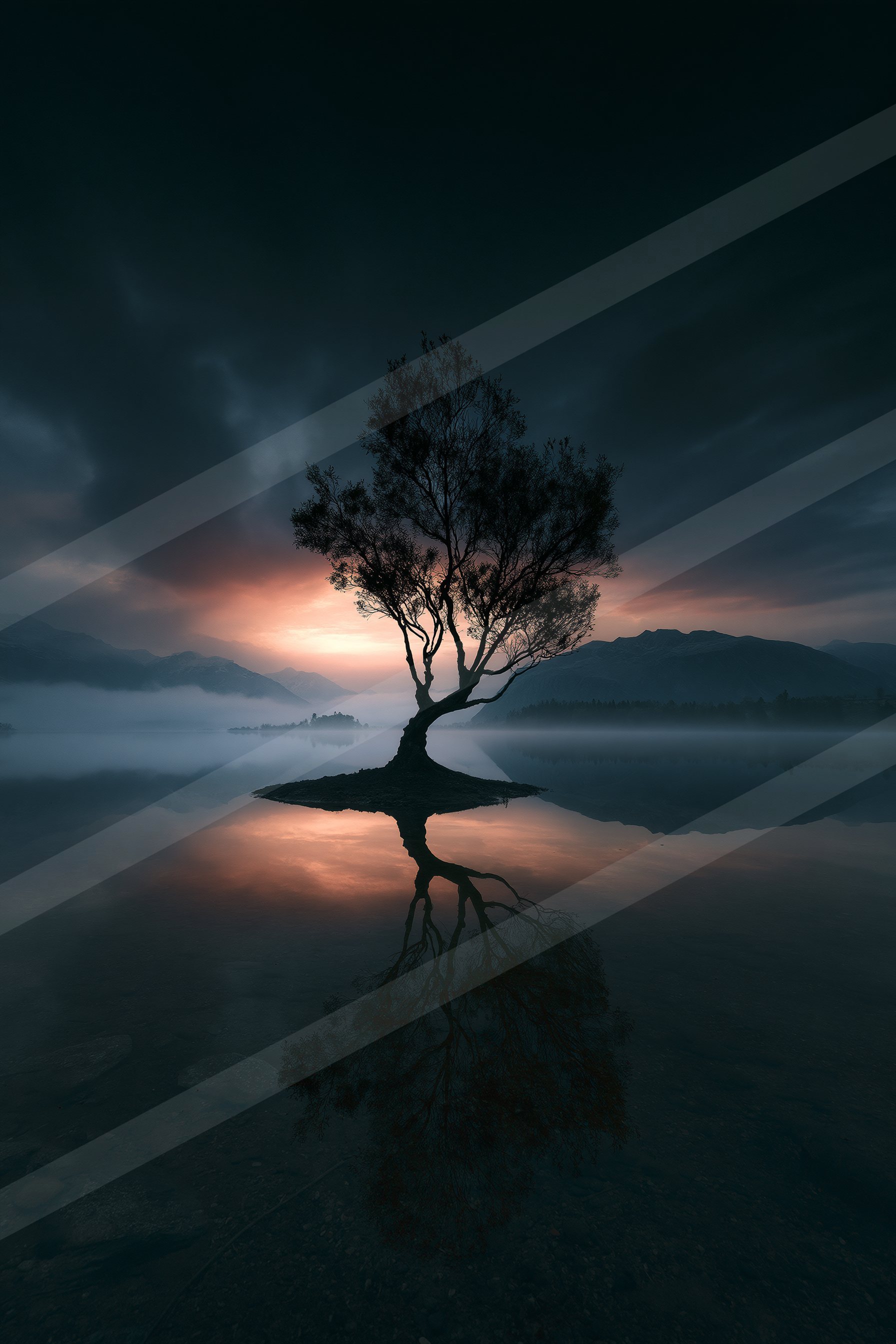A dramatic high contrast sky scene of a sunrise, reflection.