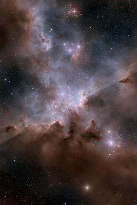 A mesmerizing view of a cosmic nebula filled with glowing clouds, vibrant colors, and twinkling stars against the dark backdrop of space.