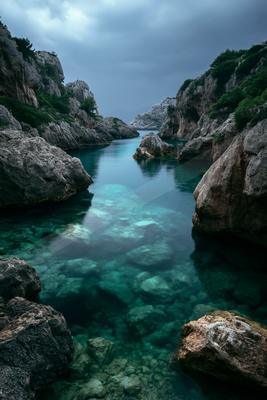 A serene long exposure water scene of river, ocean, lake.