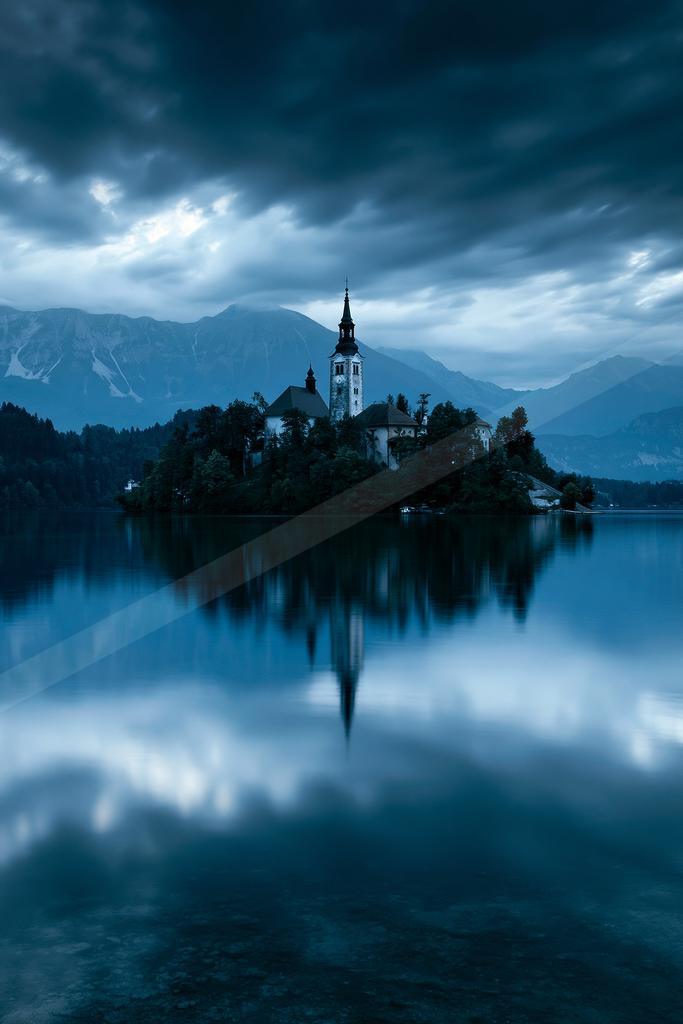 A blue hour long exposure water scene of lake, reflection.