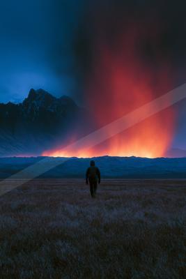 A black-toned moody photograph of volcano, bison, mountain tent.