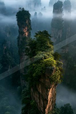 A mysterious landscape of a cliff, fog.