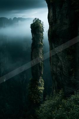 A mysterious landscape of a cliff, fog.