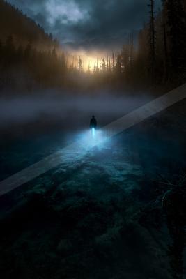 A night water scene of lake, fog.