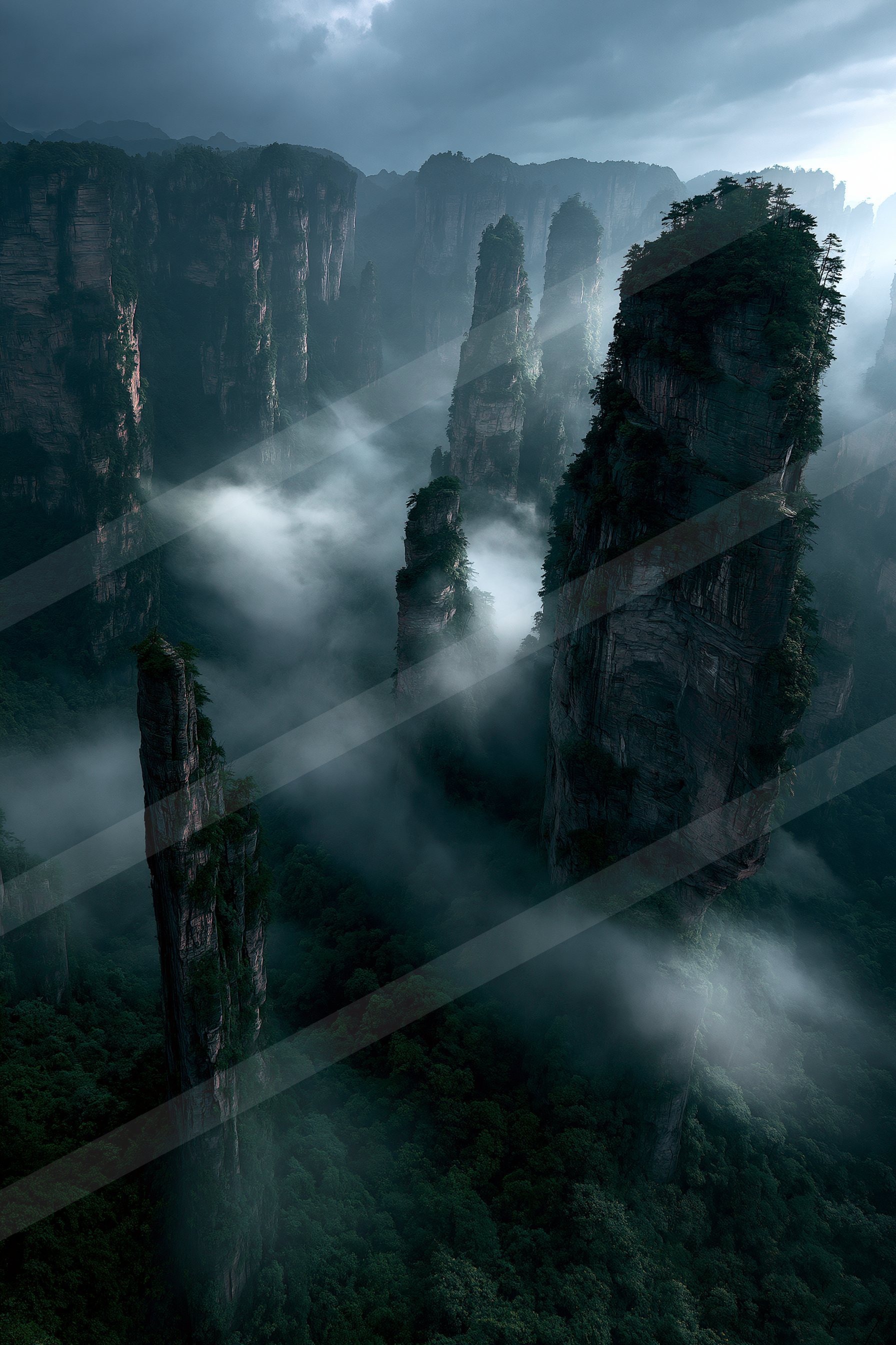 A dramatic landscape of a canyon, fog.