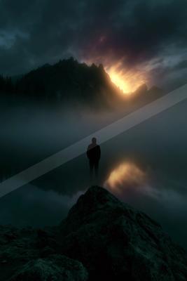A mysterious double exposure sky scene of a sunrise, reflection.