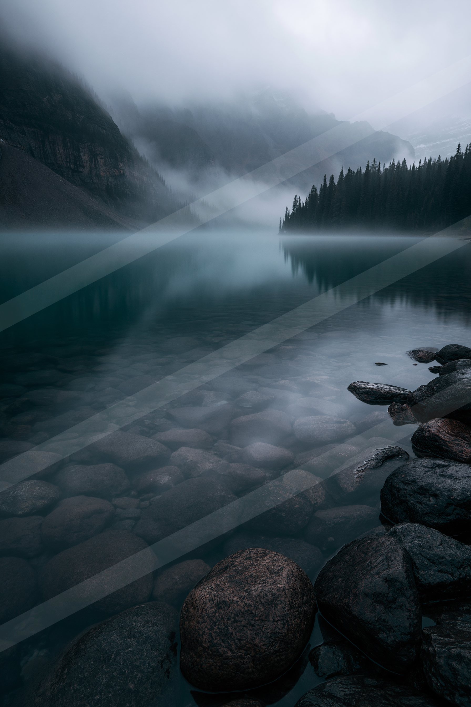 A mysterious long exposure water scene of a lake, fog.